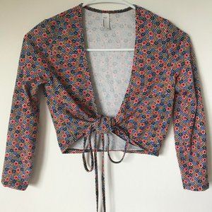 A fitted and colorful cross crop top